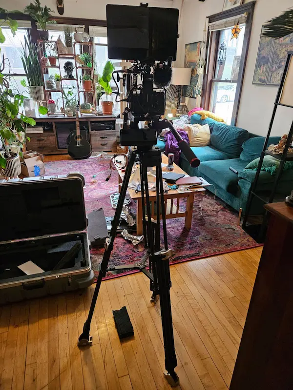 Team member filming on location during a grad session